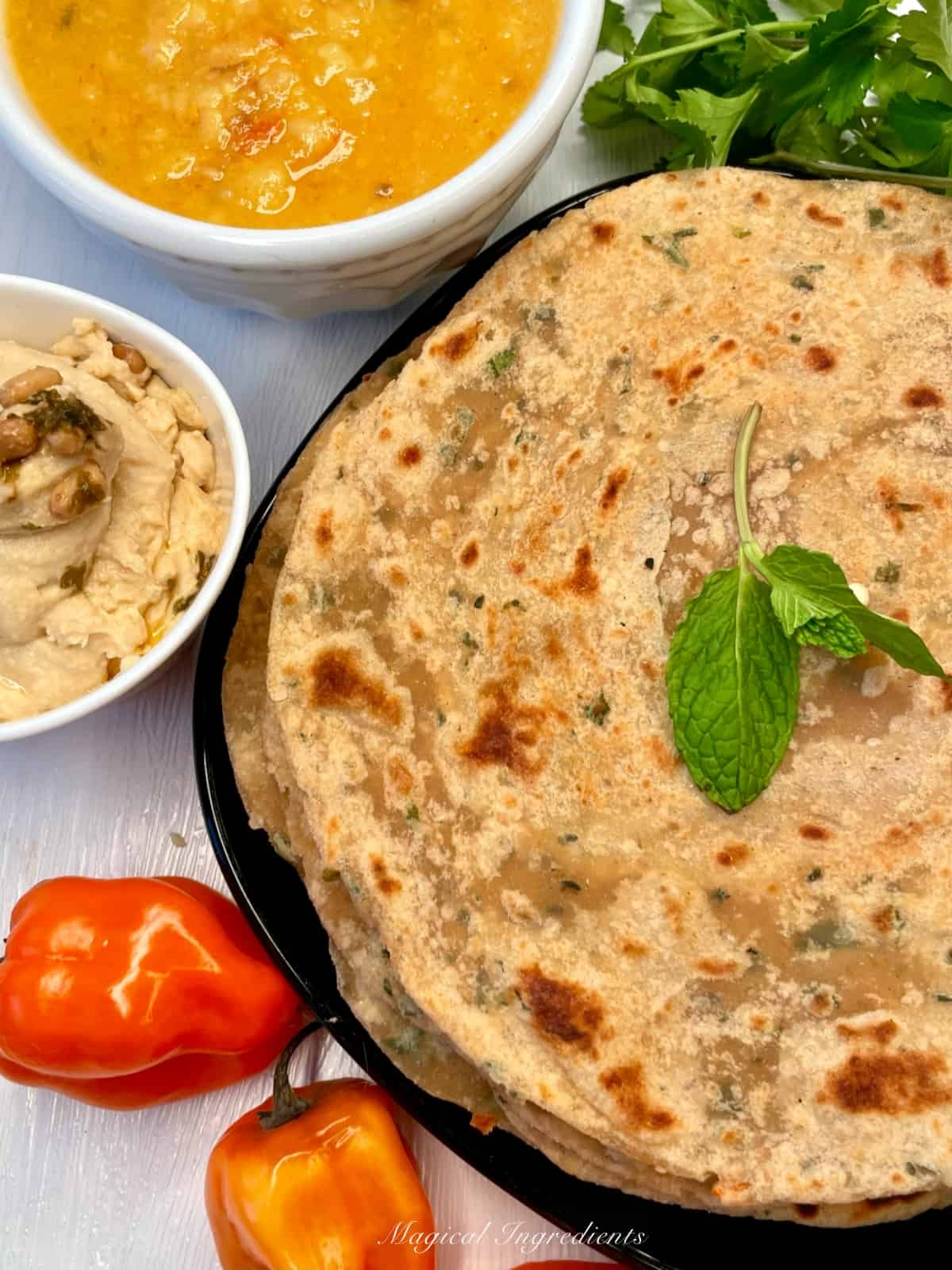 hummus herb paratha with dal, hummus