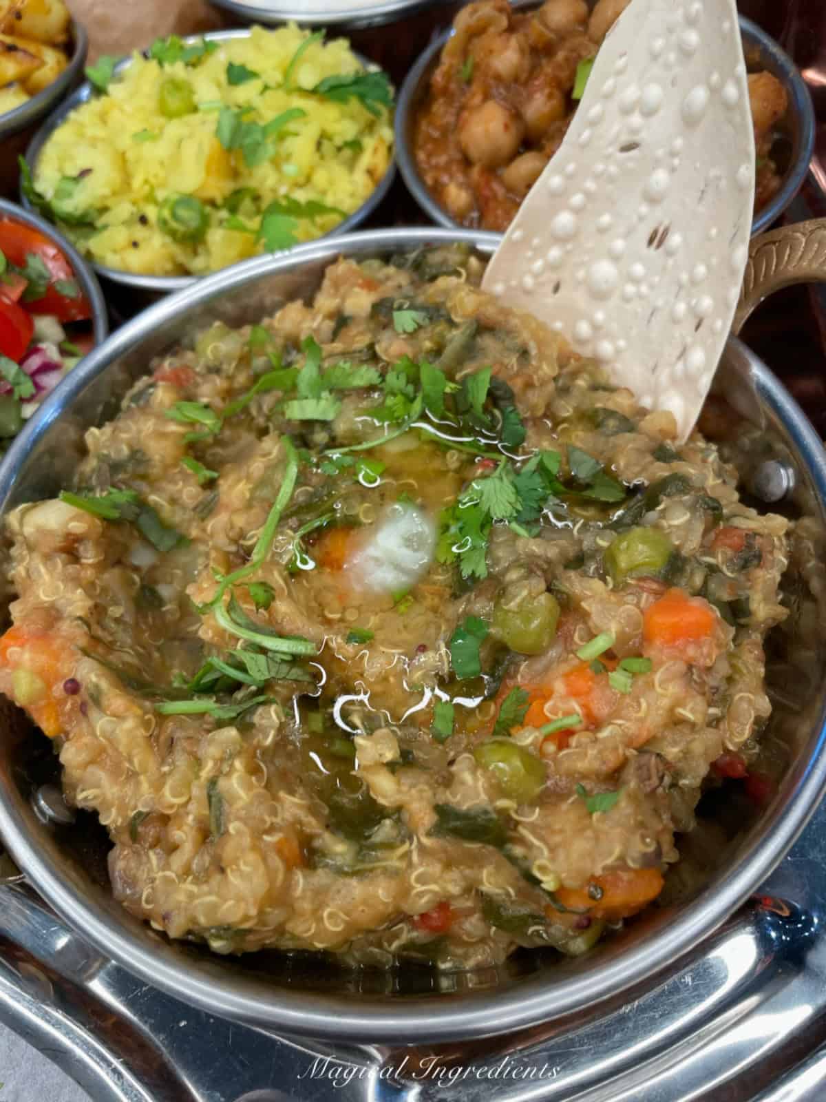 quinoa masala khichdi with a dollop of ghee