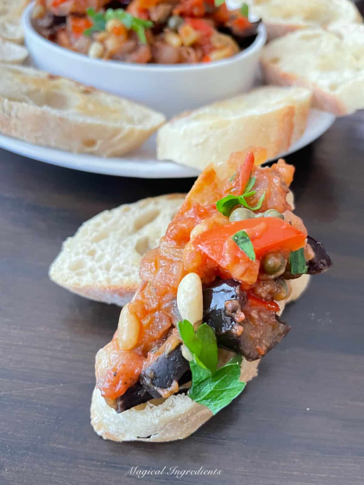 eggplant caponata served on crostini