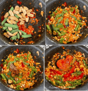 Smashing the ingredients for green papaya salad dressing