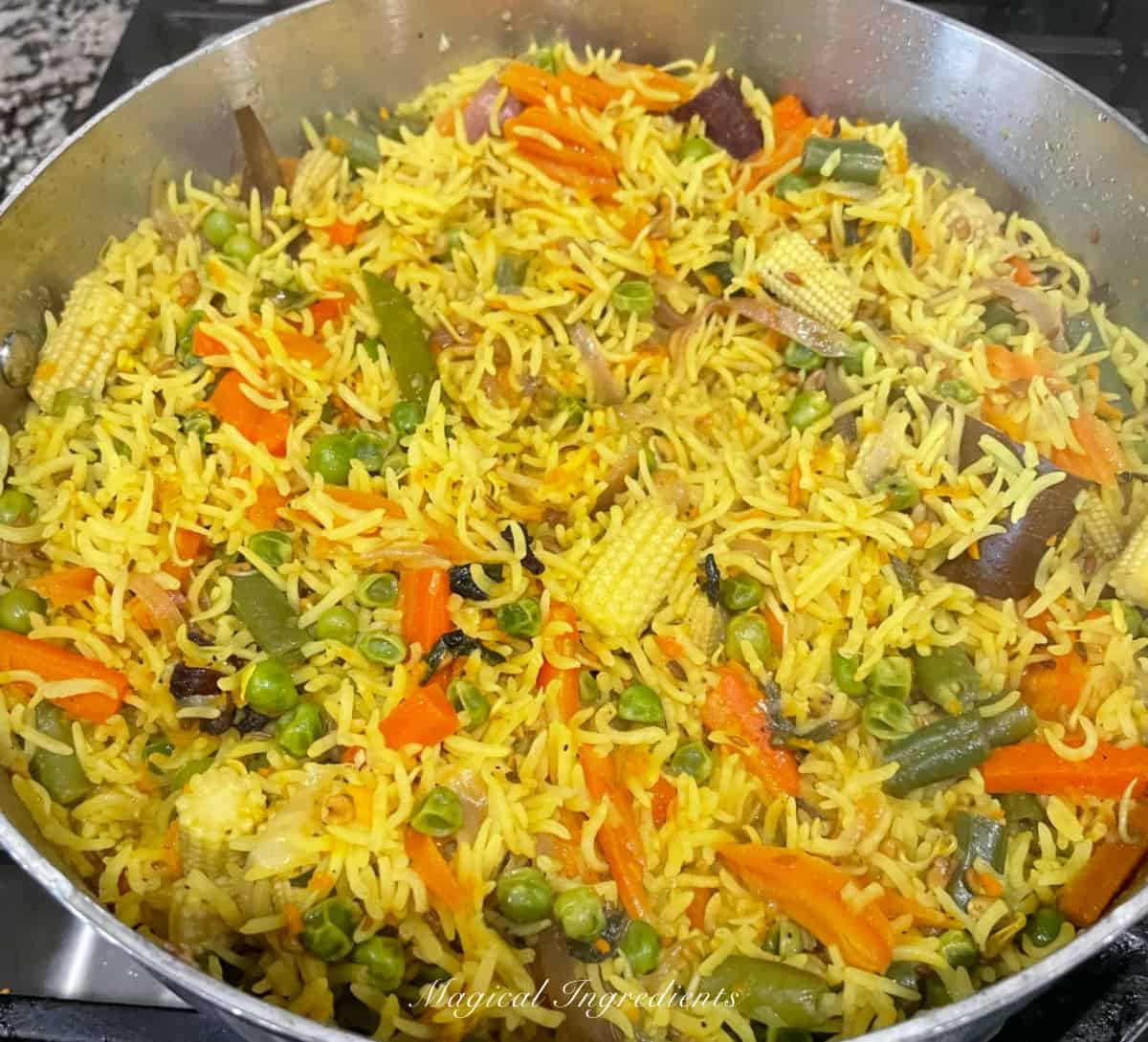 pulao cooking on the stove