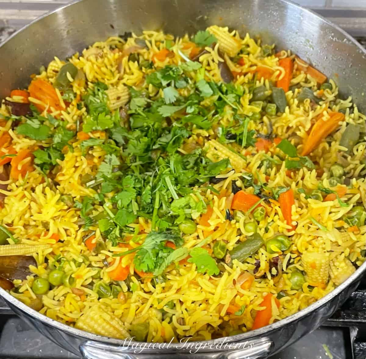 adding cilantro to pulao
