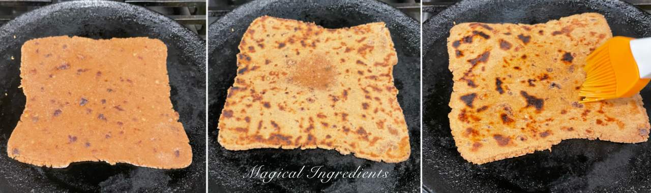 Cooking the paratha on a cast iron pan