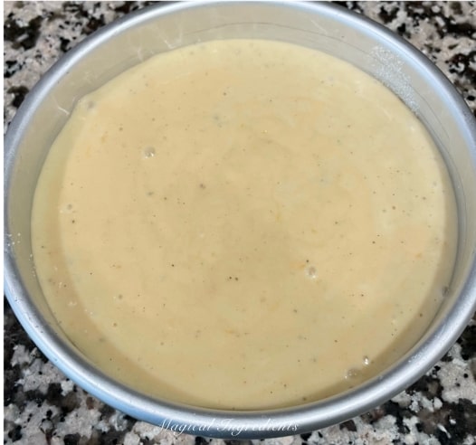 transferring the cake batter to the baking pan.