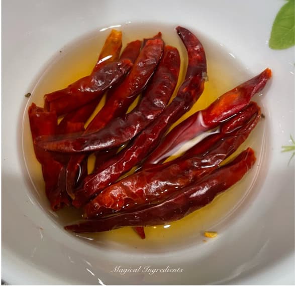 Soaking the dried red chilies