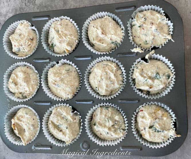 pouring the batter into muffin tin