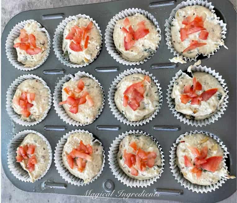 top the muffin with tomatoes